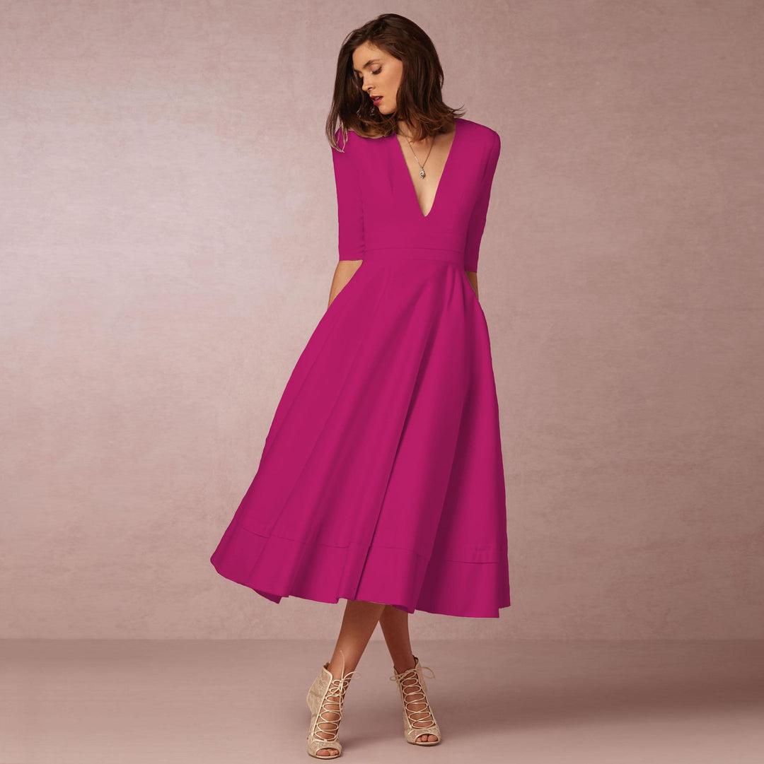 Evening Dress – Deep V Neckline & Flowing Skirt Design
