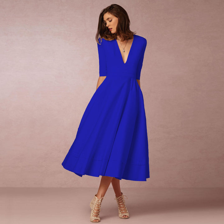 Evening Dress – Deep V Neckline & Flowing Skirt Design