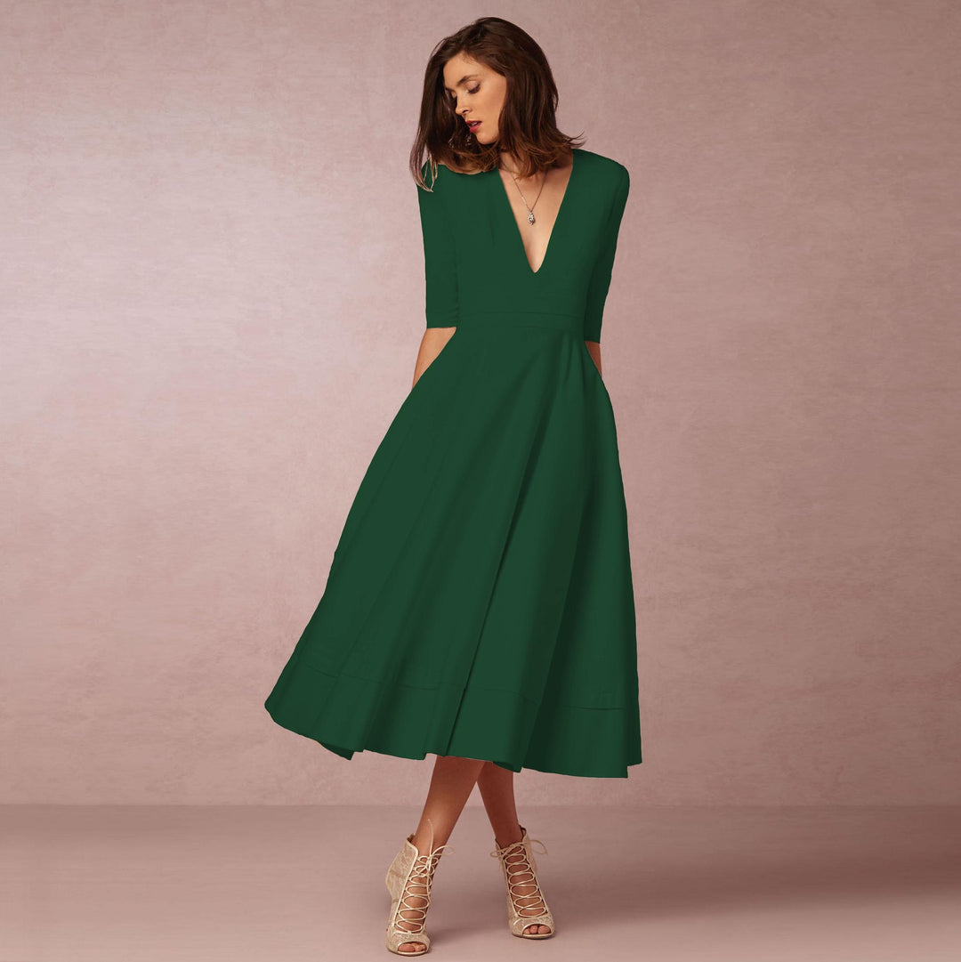 Evening Dress – Deep V Neckline & Flowing Skirt Design