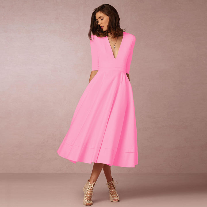 Evening Dress – Deep V Neckline & Flowing Skirt Design
