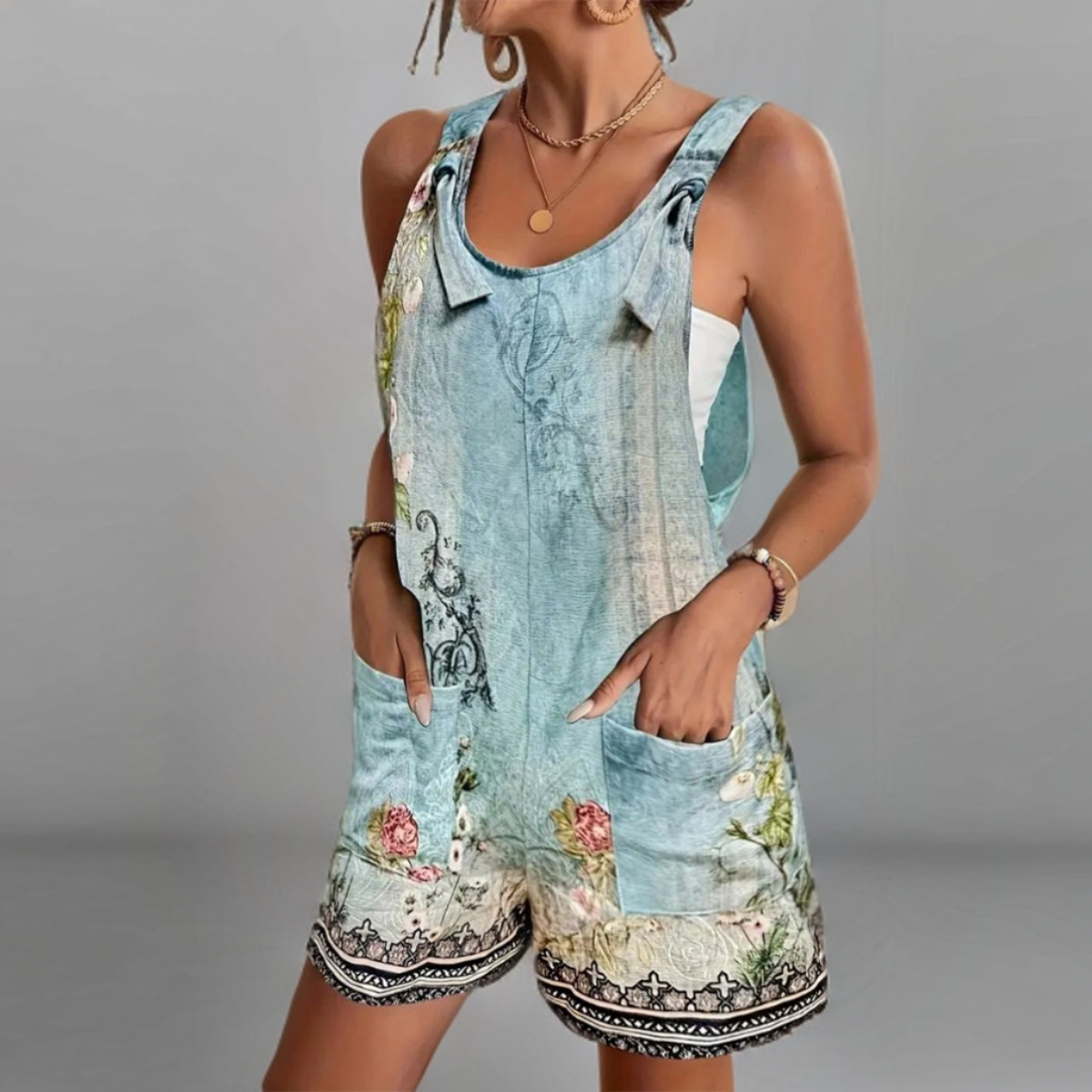 Cathleya - Blue Sleeveless Floral Print Jumpsuit