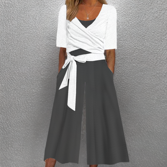 Tovia - Black and White Jumpsuit with Side Pockets and V-Neck